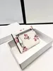 Portfele projektantów mody luksus damski portfel klasyczny biała worek zakupów torebka torebka kwiat i litera borsa