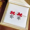 Brincos de Trend Trend Red Color Christmas Presente Longo para mulheres Bell Butterfly Knot Pérola Acessórios para jóias de casamento Presentes