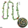 الزهور الزخرفية 1pc LED الفراشة الخفيفة سلسلة نبات الاصطناعي الأخضر لبلاب أوراق إكليل الزفاف الزفاف المنزل معلقة الزهور المزيفة الزهور