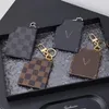 Porte-clés classique français en cuir de haute qualité, motif Double face pour hommes et femmes, très adapté au sac de voiture