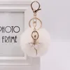 Porte-clés mignon strass petit ange voiture porte-clés pour femmes fausse fourrure boule de cheveux porte-clés femme fée sac à dos pendentif accessoires