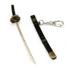 Keychains japanska anime One Piece Keychain Accessories Roronoa Zoro Three Knives Sword Alloy Key Chain Keyring Cosplay WhosedKeychains