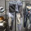 Herr jeans koreanska version lapptäcke jeans män personlighet mode slim fötter lapp tyg streetwear byxor jeans hombre mäns kläder 231118