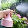 Lagringsflaskor handtryck plastpray flaska hushållsvattning kan liten potten