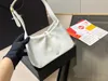 Torebka torebka mody torebka pod pachami le a57 ​​-literowa guzik otwartego zamkniętego ręcznego torby na ramię