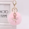 Porte-clés mignon strass petit ange voiture porte-clés pour femmes fausse fourrure boule de cheveux porte-clés femme fée sac à dos pendentif accessoires