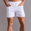 Shorts masculinos shorts shorts homens com bolsos dianteiros homens shorts gináste fitness use shorts de suor de algodão puro homens moda moda sportswear Bottoms 230419