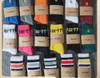 Serviette hommes chaussettes et chaussettes pour femmes 2023 mode marque américaine Carhart nouveau bas unisexe étiquette dorée brodée Sports de plein air à la mode