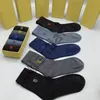 Designer Fashion Embroidery knitted mens socks letter pattern fashion womens socks sports Business casual name brand socks