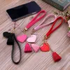 Love Heart Tassel mobiele telefoon riemen lanyard anti-lost mobiele telefoon handpols pu lederen touw voor mobiele telefoonhoes mode sleutelhanger