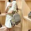60% OFF 2024 Bolsa de grife Hong Kong agente de compras couro genuíno nova moda popular este ano mochila de viagem de tamanho grande para mulheres