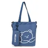 학생 배낭 캔버스 가방 새로운 어린이 핸드 헬드 학습 가방 초등학교 가방 메이크업 레슨 싱글 숄더 돛 가방 인쇄 대각선 가방 가방