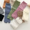 Femmes Chaussettes Femmes Flip Flop Sandale Split Toe Agaric Bord Solide Couleur 2 Pied Doigt Coton Chaud Mi Tube