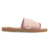 Zapatillas de madera de diseñador Sandalias para mujer Mulas Diapositivas planas Bronceado claro Beige Blanco Negro Rosa Letras de encaje Tela Lona para mujer Zapatos de verano al aire libre