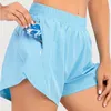 LL Yoga Shorts Heiße Hochhäusern losen atmungsaktive Schnelltrocknen Sport Shorts Reißverschluss-Up-Taschen Frachthosen Damen mit kontinuierlicher Drawcord würzige kurze Hose