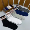 Designer Fashion Embroidery knitted mens socks letter pattern fashion womens socks sports Business casual name brand socks