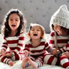 Família combinando roupas natal olhar 2023 inverno pai criança 2 peças terno macio sleepwear infantil bebê macacão natal listrado padrão pijama conjunto 231118