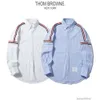 Designer Camicie da uomo Moda Abbigliamento casual Tb Ox d Cotone Primavera Estate Autunno Nuovo Rosso Bianco Blu Strisce Versatile Camicie a maniche lunghe Uomo Donna Coppie
