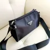 cleo di lusso Borsa a tracolla a tracolla impermeabile Borsa a tracolla in nylon impermeabile Designer di lusso borse a mano Portafoglio hobo portachiavi da viaggio zip logo triangolo in metallo Accessori per il tempo libero