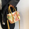 学校のバッグディスカブリハンド女性高品質のショルダーバッグファッショングラフィティ財布とハンドバッグデザイナークロスボディキュートサッチェル