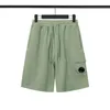 Mäns shorts 2023 Spring and Summer CP Casual Pure Cotton Solid Color Fashion Round Lens Sports Straight 230419