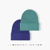 Beanie Skull Caps Sticked Hat Women's Core Garn Versatile Outdoor Warmth Baotou Cold Hat Herrens förtjockade pärlor svart ullhatt