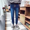 Mäns jeans Sommarmän små fötter koreanska mode på baggy cowboy leggings hip hop mens denim Harlan byxor