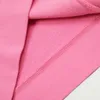メンズパーカースウェットシャツアメリカンビンテージピンクの男性女性ゆるいカジュアルグラフィティ炎印刷フード付き231118