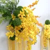 Kwiaty dekoracyjne niestandardowy żółty wiszący ryż sztuczny aranżacja rzędu kwiatowego