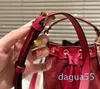 Classique Original HighLuxury Marque Mini seau Qualité Luxe Designer Postmanes Portefeuille Sac à main à la mode pour dames Sac à bandoulière Sac de mode