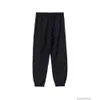 Designers casual pant streetwear jogger byxor sweatpants dimmar essen säsong 8 dubbelspår high street womens lös casual flocking tryckt byxa fötter blixtlås p