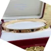 Tunn kärlek Bangle smal utgåva armband för kvinnor guldpläterade 18k damer armband designer officiella replika reproduktioner utsökt gåva 008 62dn