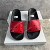 Munich Hombres Mujeres Zapatillas de cuero Zapatillas de casa Floraciones Estampado de geranio Negro Naranja Sandalias Zapatos Mujer Chanclas Lujo Pantufles Sandalias Diapositivas de verano con caja