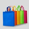 Nouveaux sacs pliants colorés Tissu non tissé Sacs à provisions pliables Réutilisables Sacs pliants écologiques Nouvelles Sacs de rangement pour dames Inventaire en gros