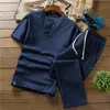 Mens Tracksuits High quality cotton and linen thin set slim solid color shortsleeved Tshirt large size loose casual breathable trousers 230420