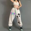 Kvinnors byxor kvinnor hip-hop casual sports-blockerande byxor europeiska amerikanska street tröjor korstryck jazzdans leggings