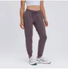 2079 Kvinnor Naken Känn Fabric Workout Sport Joggers Pants Midja Drawstring Fitness Running Sweat Pants With Two Side Pocket Crossway Size 4-128220127