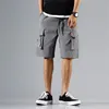 Herr shorts män last taktiska joggar arbetar casual byxor manliga multi fickor knappar lossa bred ben knä längd sommaren 230419