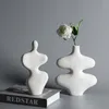 Vaser nordiska keramiska vita kontor tillbehör kropp hydroponic ikebana minimalistiska vaso ceramica lyxheminredning yy50hp