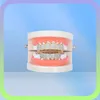 Shining Hip Hop Grillz Iced Out CZ Fang Mouth teeth grills Caps Top Bottom tooth Set Men Women Vampire Grills Fashion Jewelry9409744