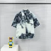 23SS Hommes Femmes Designers Denim T-shirts Dye Jacquard Lettre À Manches Courtes Col Ras Du Cou Streetwear Bleu