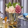 Vases Vase doré en métal fleurs Pot Arrangement de fleurs florales plaqué alliage verre Vases décoration de bureau moderne luxueux décor à la maison 231120