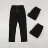 Designerkläder Fritidsbyxa RHUDE Funktionell arbetsdräkt för män med flera fickor Spänne Rakt rör Lös Mode Arbetsdräkt Svarta byxor Streetwear Jogger