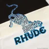 Tees TShirts Luxury Mens Designer Fashion clothing Rhude American High Street Fashion Br Summer Casual Cartoon Leopard Animal Pattern Printed Short Sleeve Tee Shir