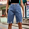 Shorts pour femmes 2023 Summer Femmes Denim Taille haute Ripped Jeans Street Perforé Mode Frange de fourrure Cinq points 230419