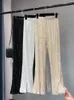 Damesbroek Nieuwe damesmode glanzende witte broek Showcase hoge taille glanzende broek met pailletten 231120
