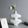 Vaser nordiska keramiska vita kontor tillbehör kropp hydroponic ikebana minimalistiska vaso ceramica lyxheminredning yy50hp