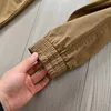 Projektant męski proste spodnie jesień i zima nowa moda Wysokiej jakości jedwabny jedwabny wygodny materiał bawełniany multipapiełowe spodnie ładunkowe Z30C#