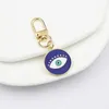 Groothandel Evil Eye Key Rings Keychain Mobiele telefoon Case Charms Airpods Case Hanger Keyring voor mannen Geschenk vrouwen Bag ornamenten Accessoires