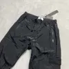 Stones Island Marque Designers Pantalon Pierre Métal Nylon Poche Badge Pantalon Occasionnel Mince Réfléchissant 929 256